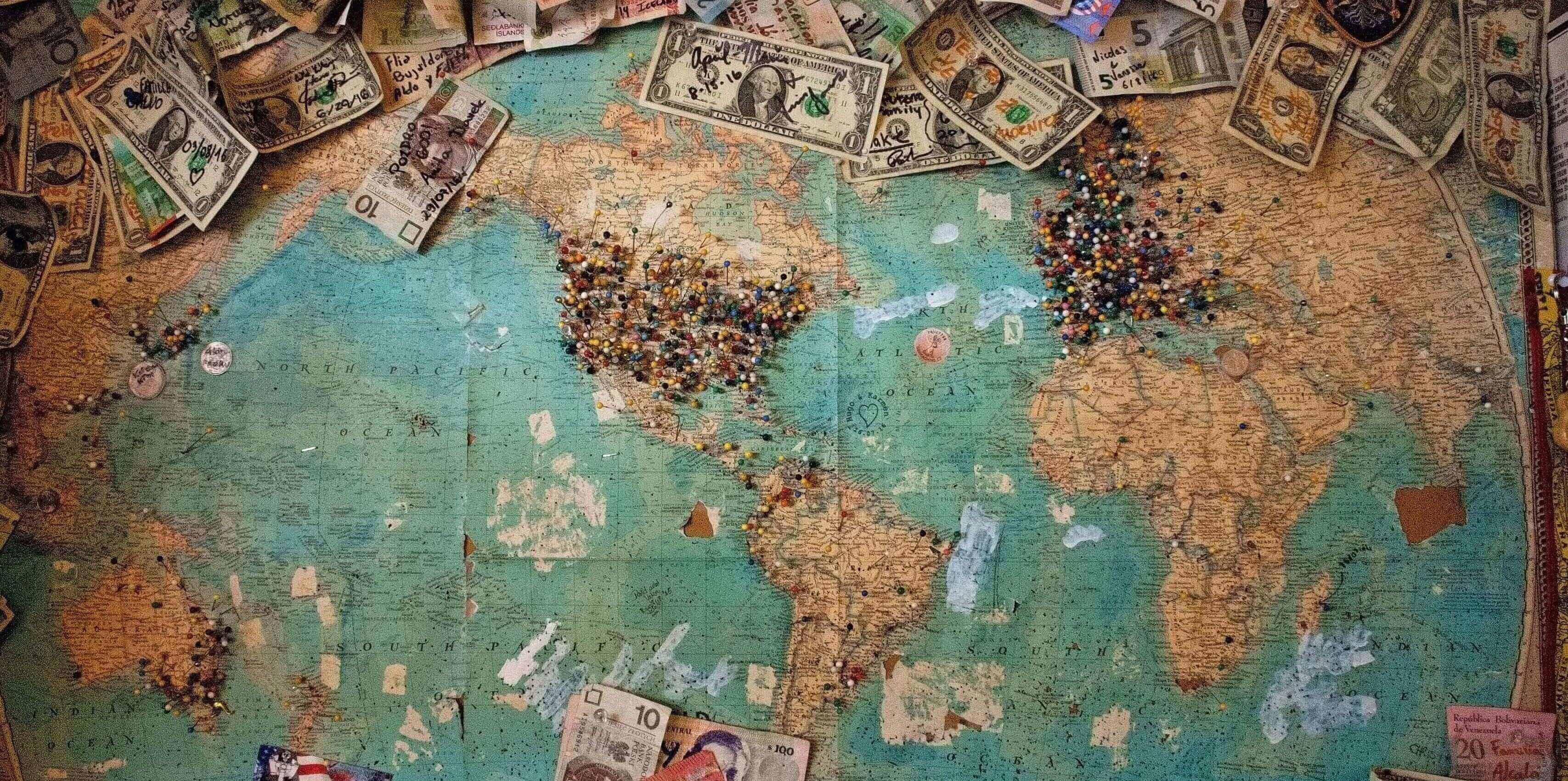 map covered in money and pins