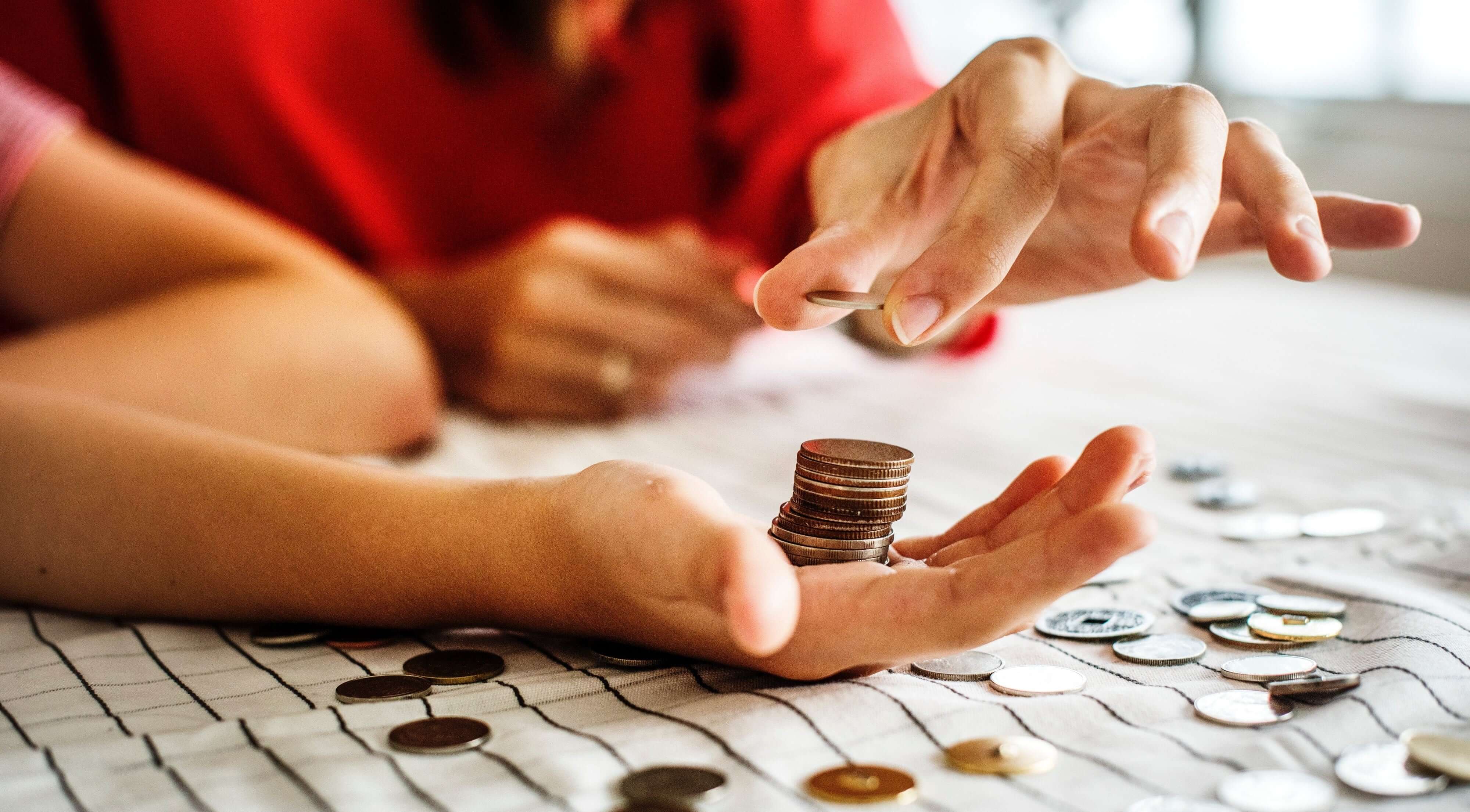 someone counting coins