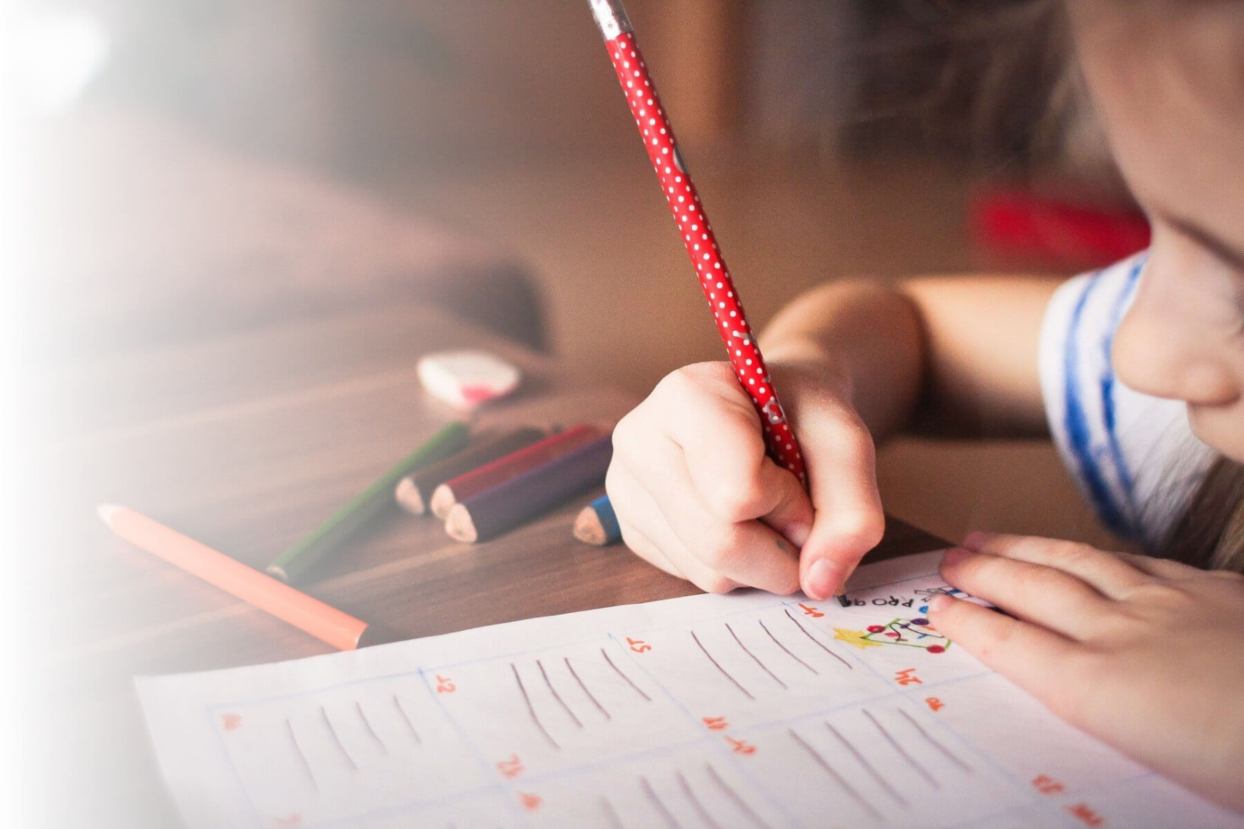 child doing an assignment in class