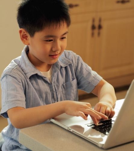 Chinese child on laptop